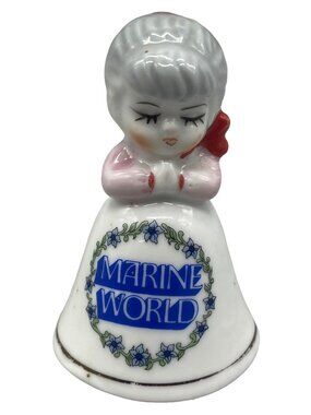 Vintage ceramic bell Marine World lady gray hair black eye lashes READ